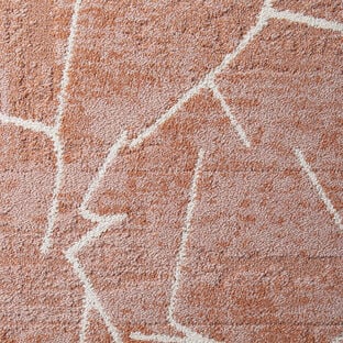 FLOR Terrain carpet tile shown in Coral