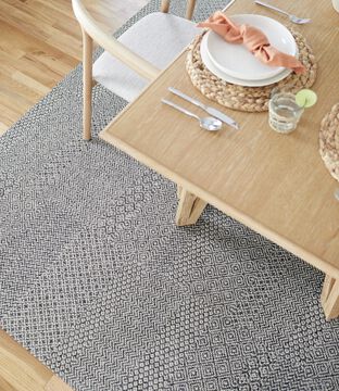 Detail of NEW FLOR Banter rug shown in Pearl/Fieldstone